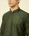 alt message - Manyavar Men Dark Green Lattice Patterned Sequined Kurta Set image number 1